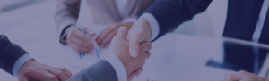 Two gentlemen shaking hands