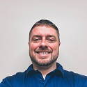 Cory Besbitt - smiling in photo