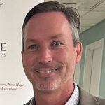 Eric Baumgartner headshot, smiling