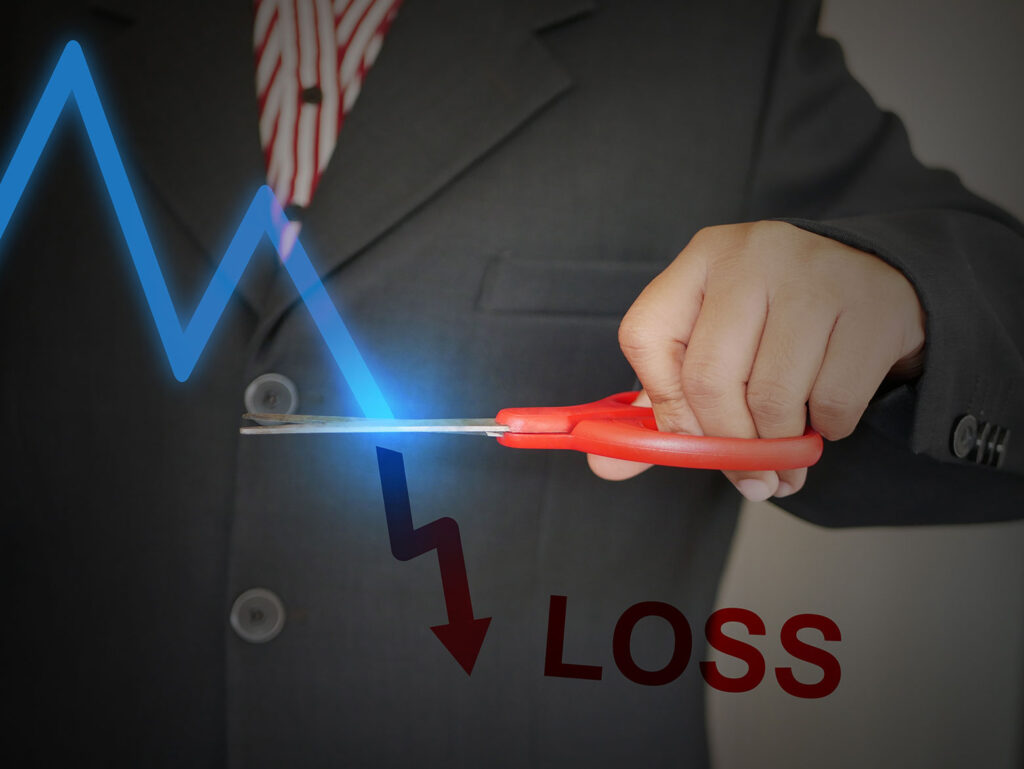 Man cutting loss